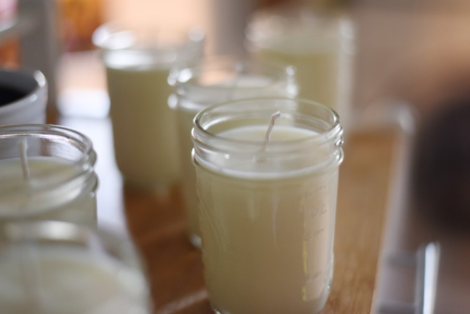 DIY Citronella Candles to keep mosquitos away from your picnics and outdoor gatherings in the summer! Easy to make using soy wax and essential oils. | Feathers in Our Nest